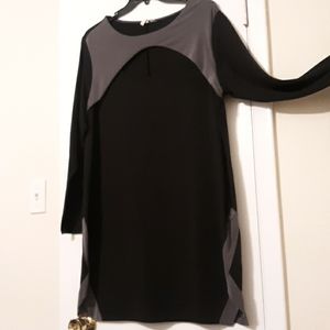 Black and grey knee length dress.